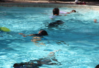 Keep on Moving: Swimming and Playing in Water